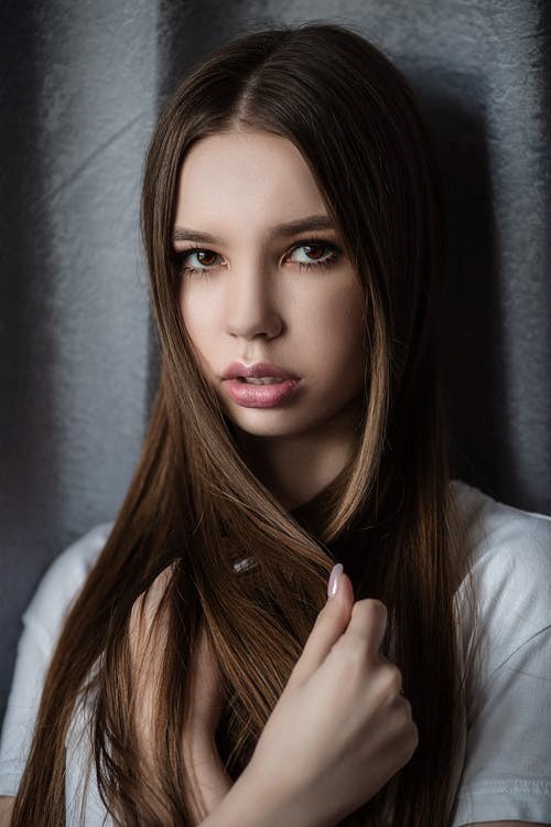 A girl with the best hair extensions in Houston